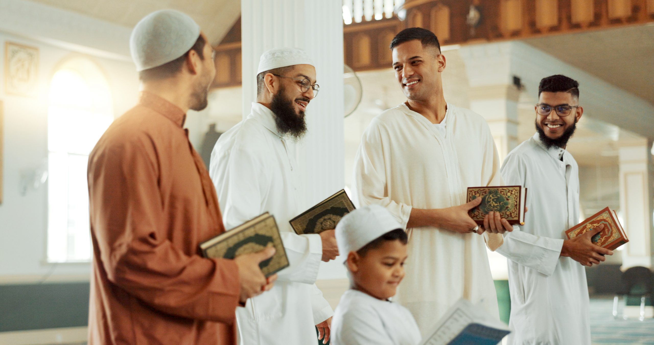 islam-smile-and-group-of-men-in-mosque-with-child-2025-04-06-07-41-06-utc